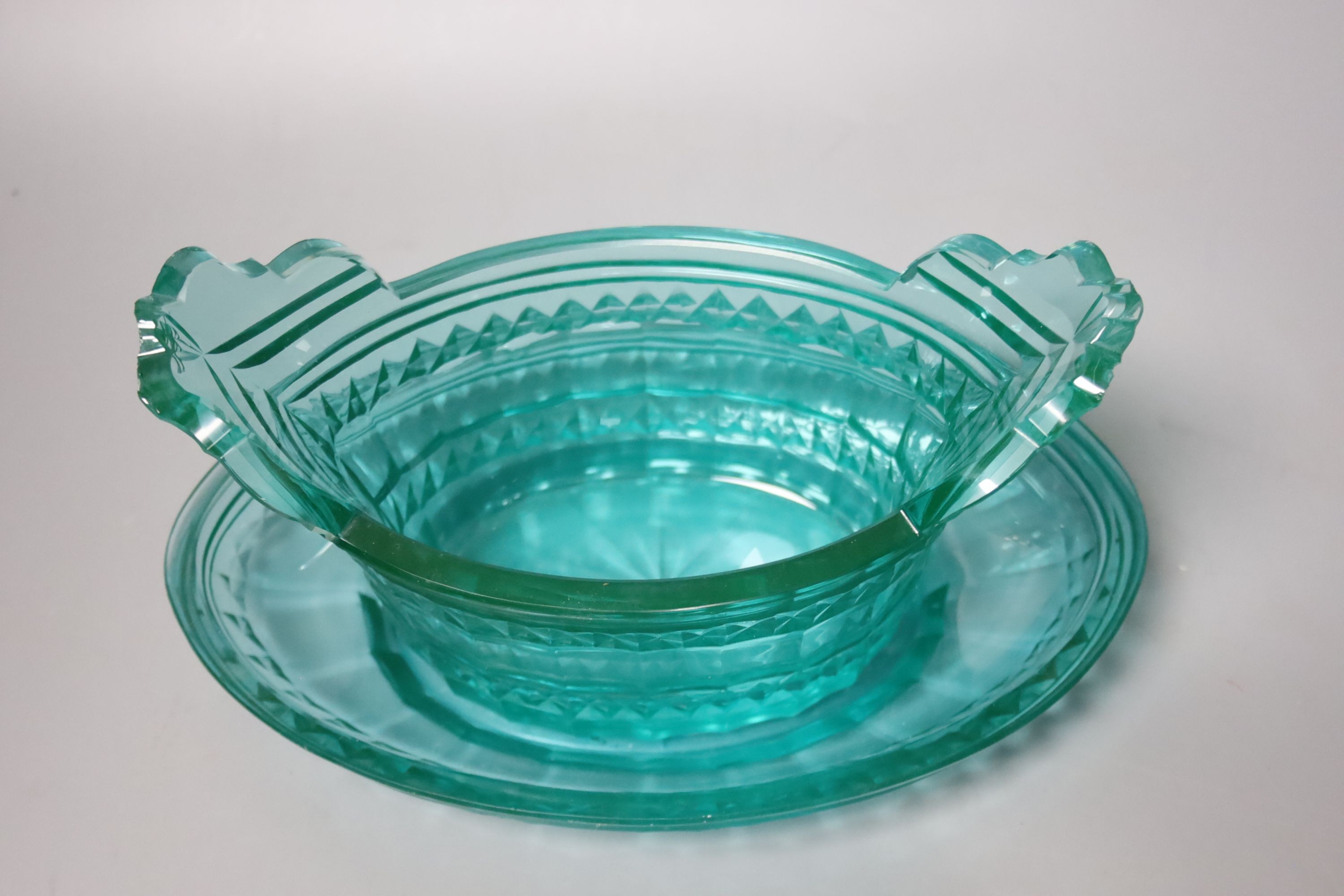A Regency translucent green glass basket and stand 24.5cm